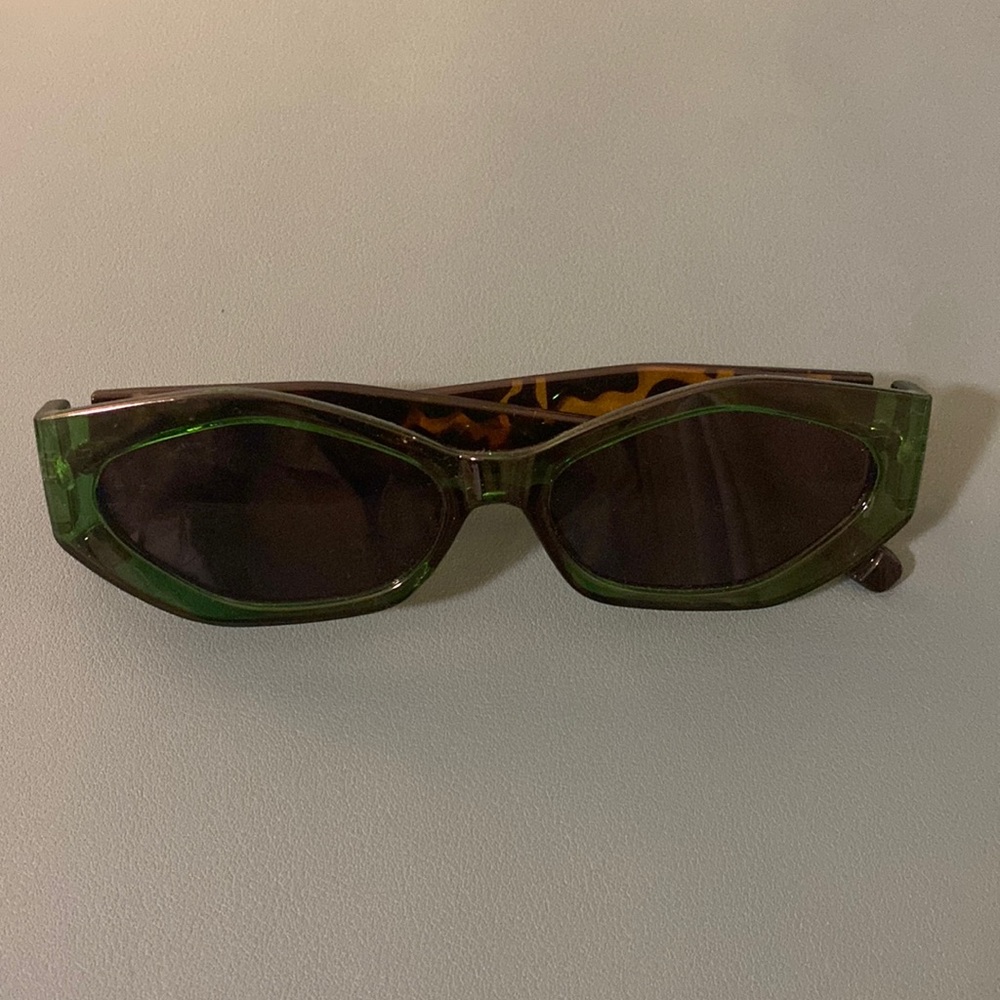 Green frame sunglasses with tortoise frame